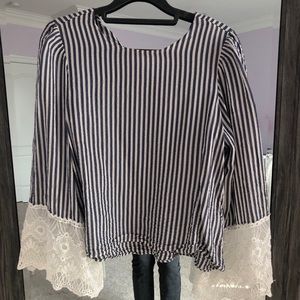 Striped blouse with white lace sleeves